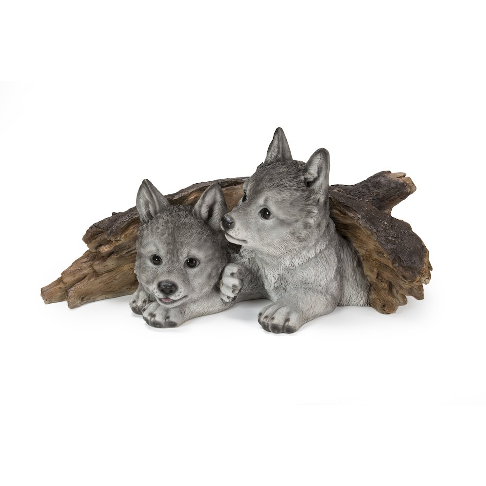 Grey Wolf Cubs Hiding Under Log Statue. Picture 2