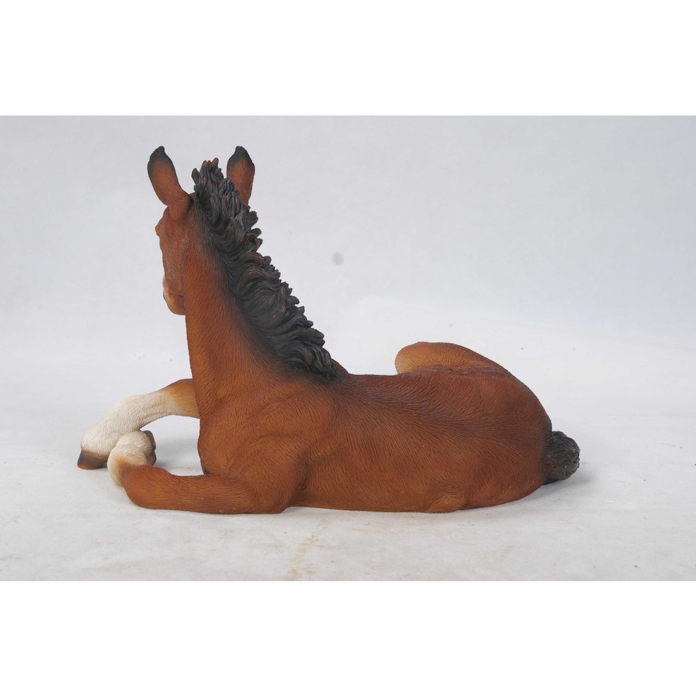 Horse Colt Laying Down Statue. Picture 4
