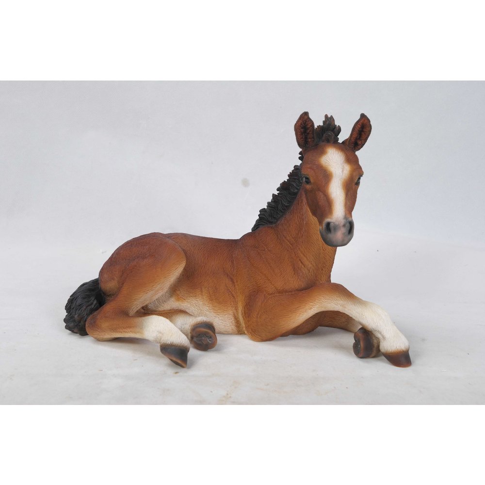 Horse Colt Laying Down Statue. Picture 2