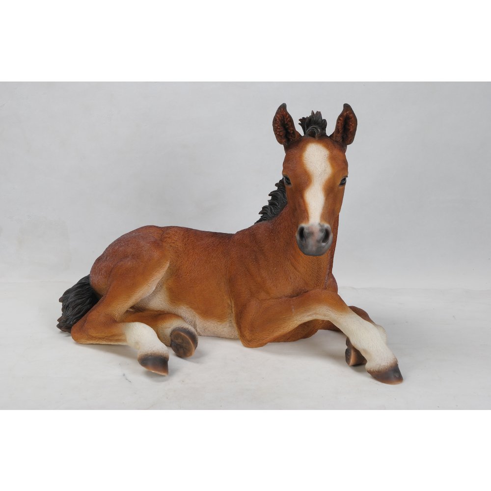 Large Horse Colt Laying Down Statue. Picture 2