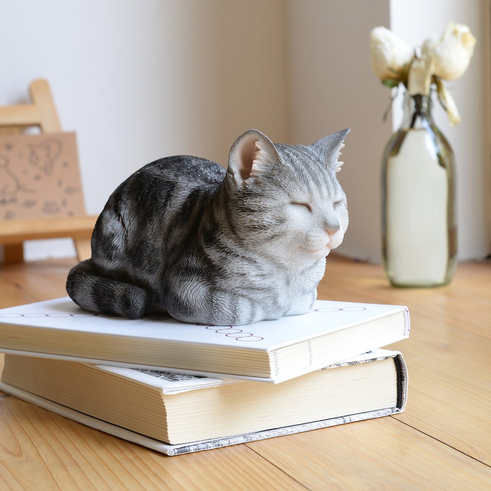 Tabby Tranquility: Whimsical Black Polyresin Napping Cat Figurine. Picture 2