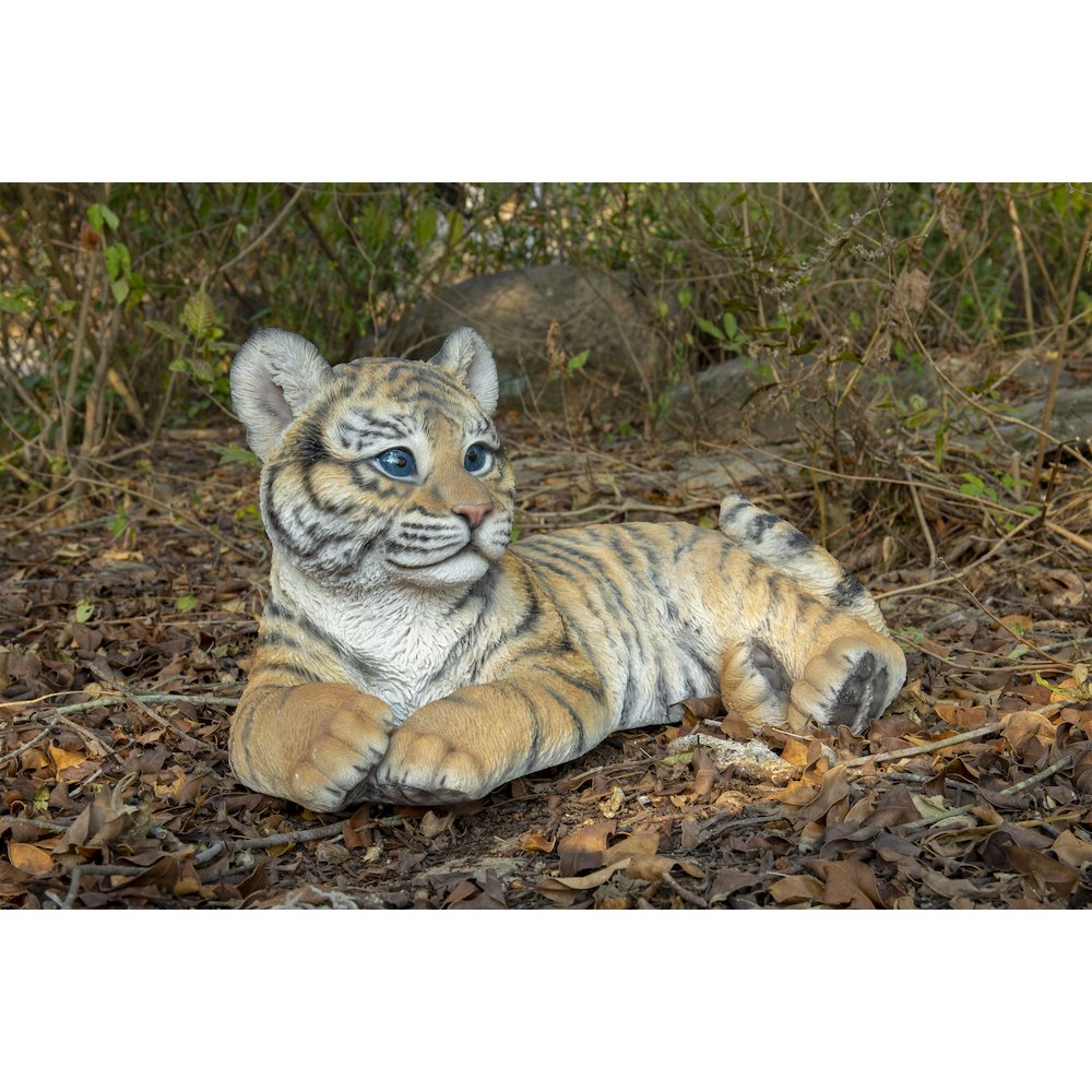 Baby Yellow Tiger Cub Laying Down Statue. Picture 3