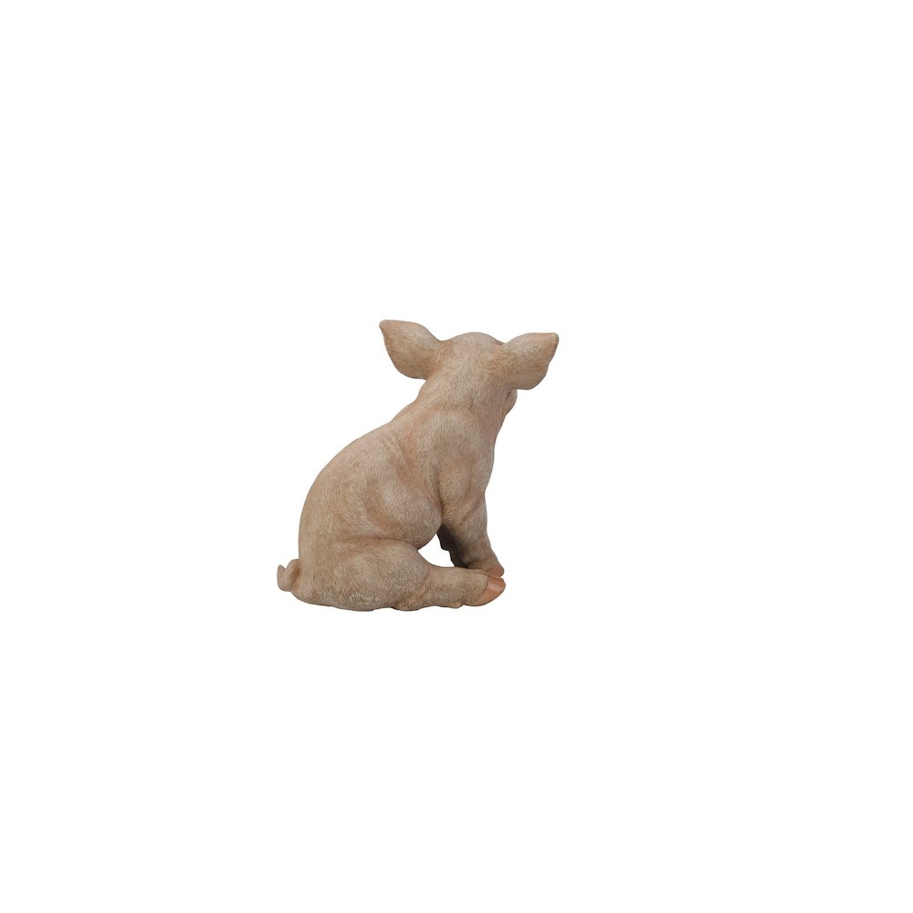 Small Sitting Pig Statue. Picture 1