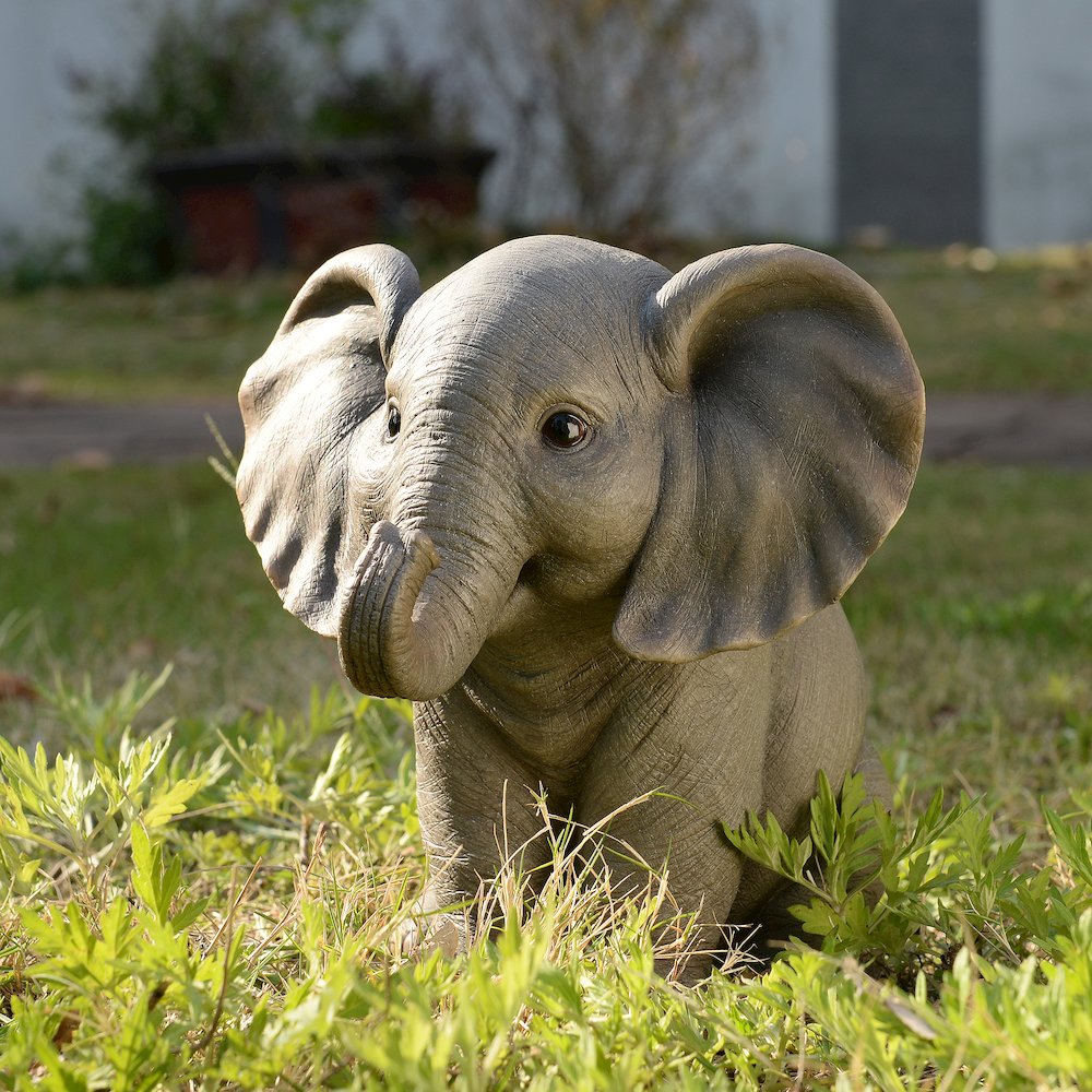 Sitting Baby Elephant W/Trunk Up. Picture 2