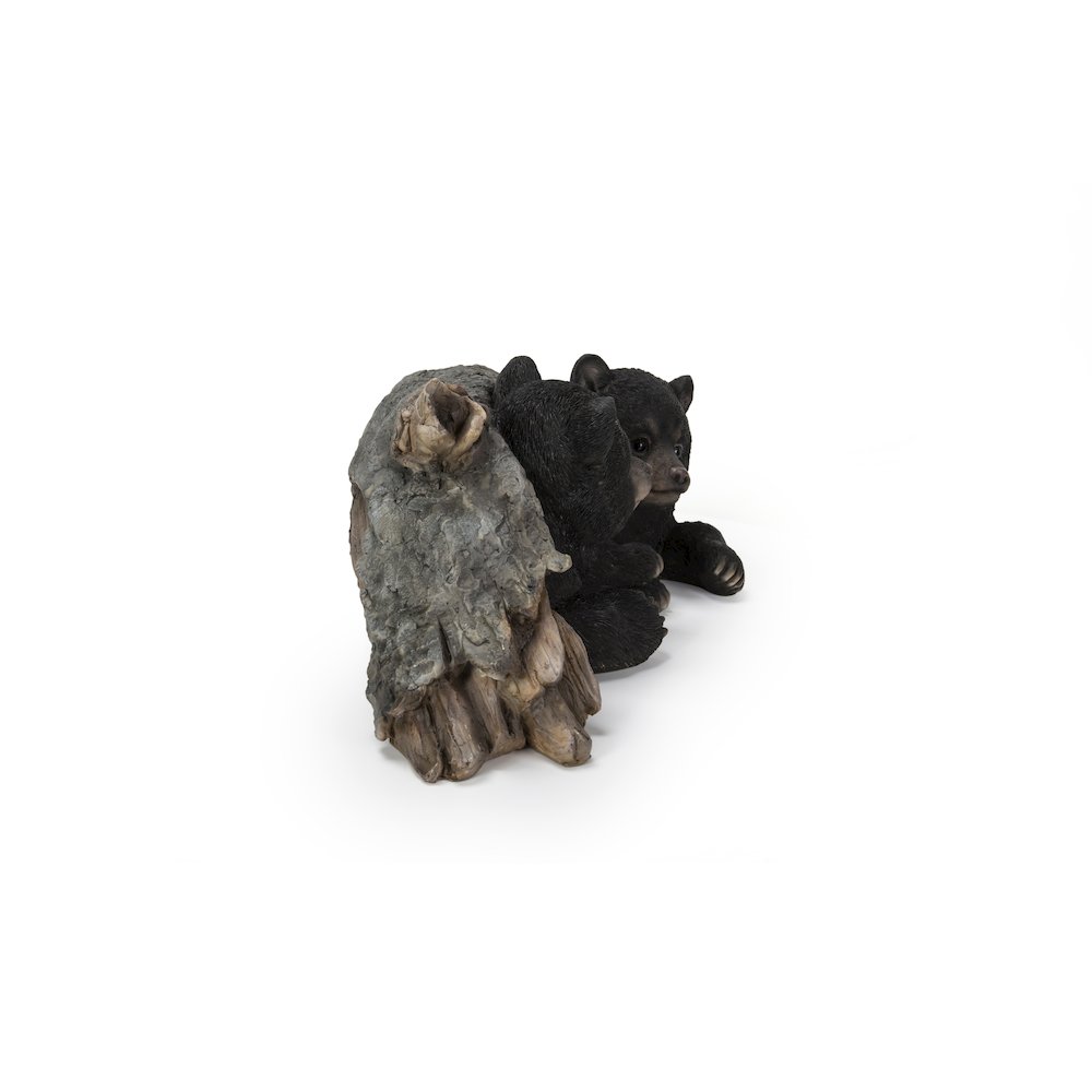 Black Bear Cubs Hiding Under Log Statue. Picture 4