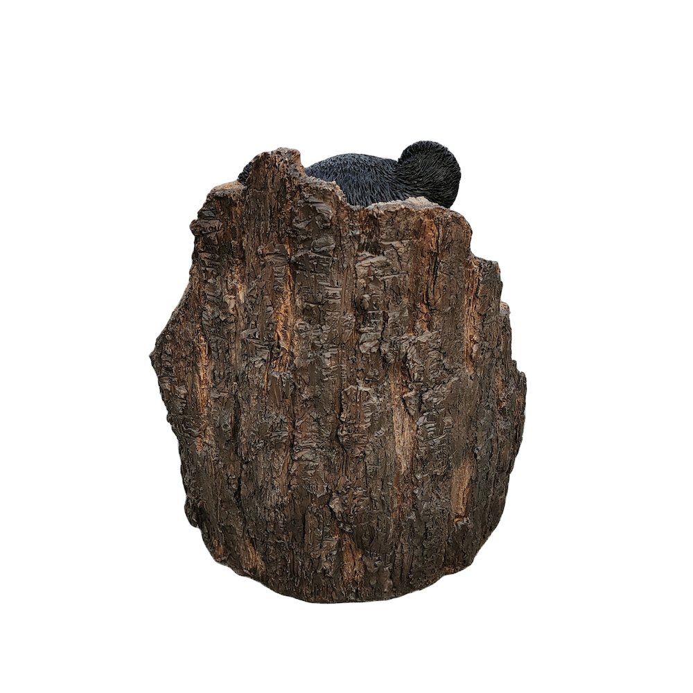 Lone Cub Haven: Intriguing Black Polyresin Bear in Stump Figurine. Picture 5