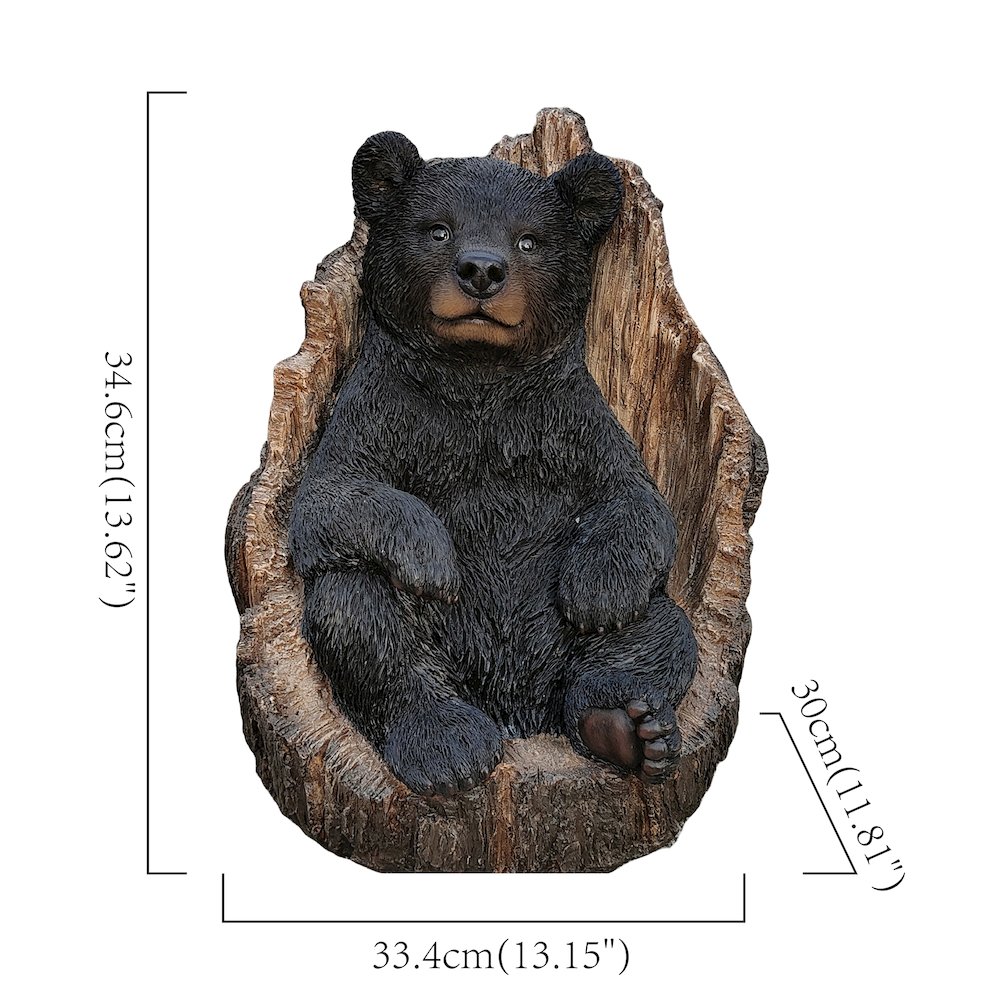 Lone Cub Haven: Intriguing Black Polyresin Bear in Stump Figurine. Picture 3