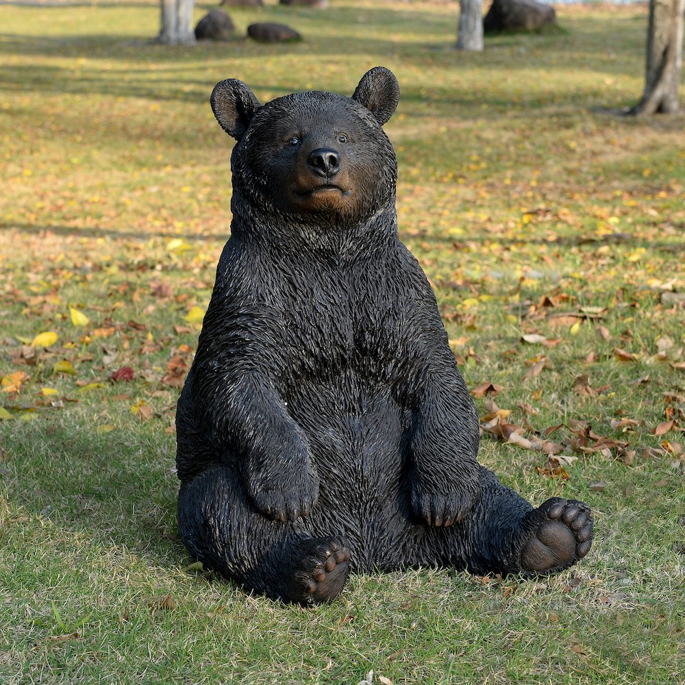 Onyx Guardian: Majestic Black Polyresin Sitting Bear Figurine. Picture 2