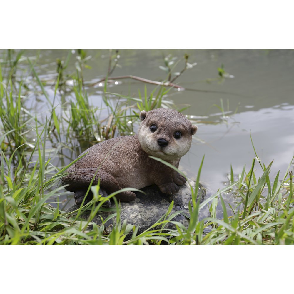Otter Laying Back Statue. Picture 6