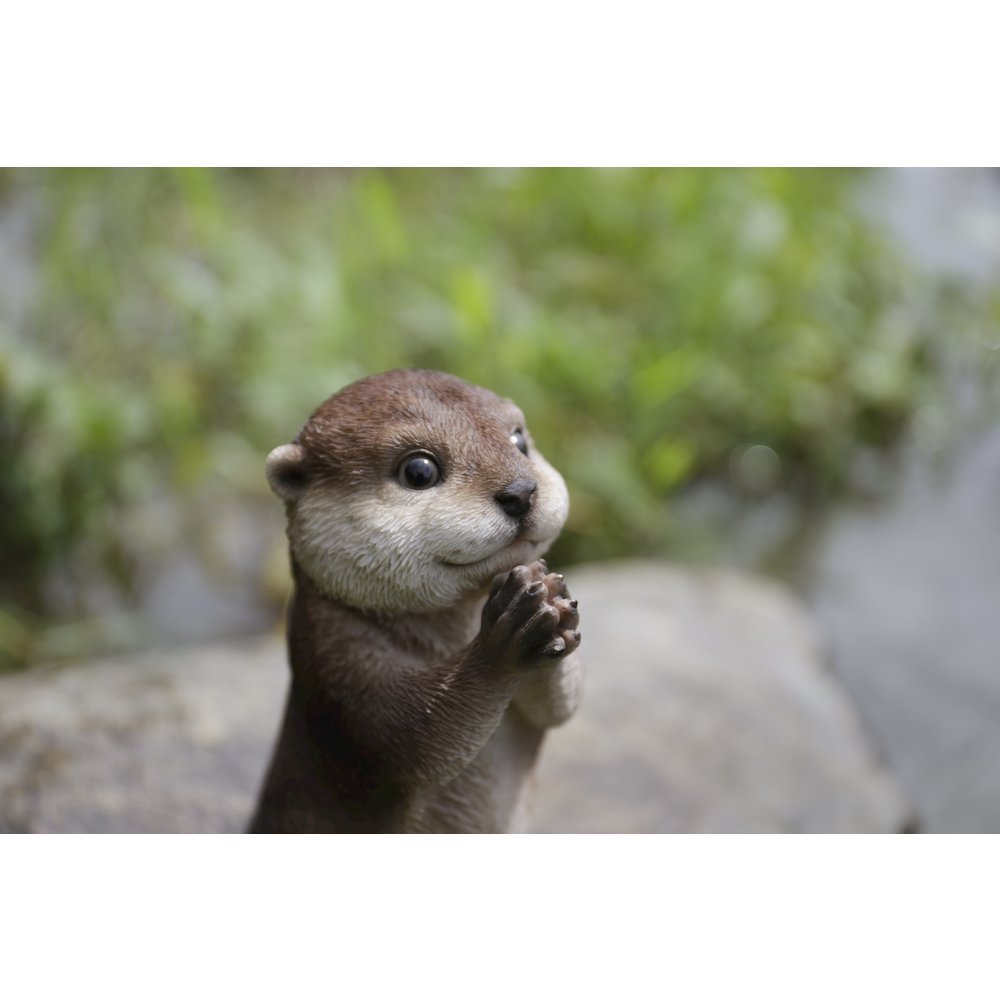 Otter Praying Statue. Picture 6