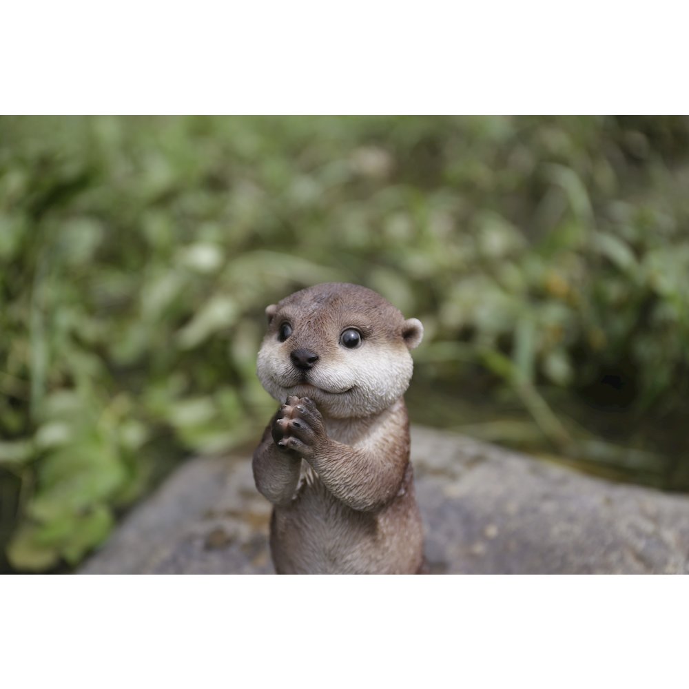 Otter Praying Statue. Picture 7