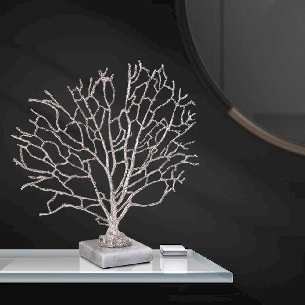 Study of Coral Sculpture On A White Marble Base. Picture 2