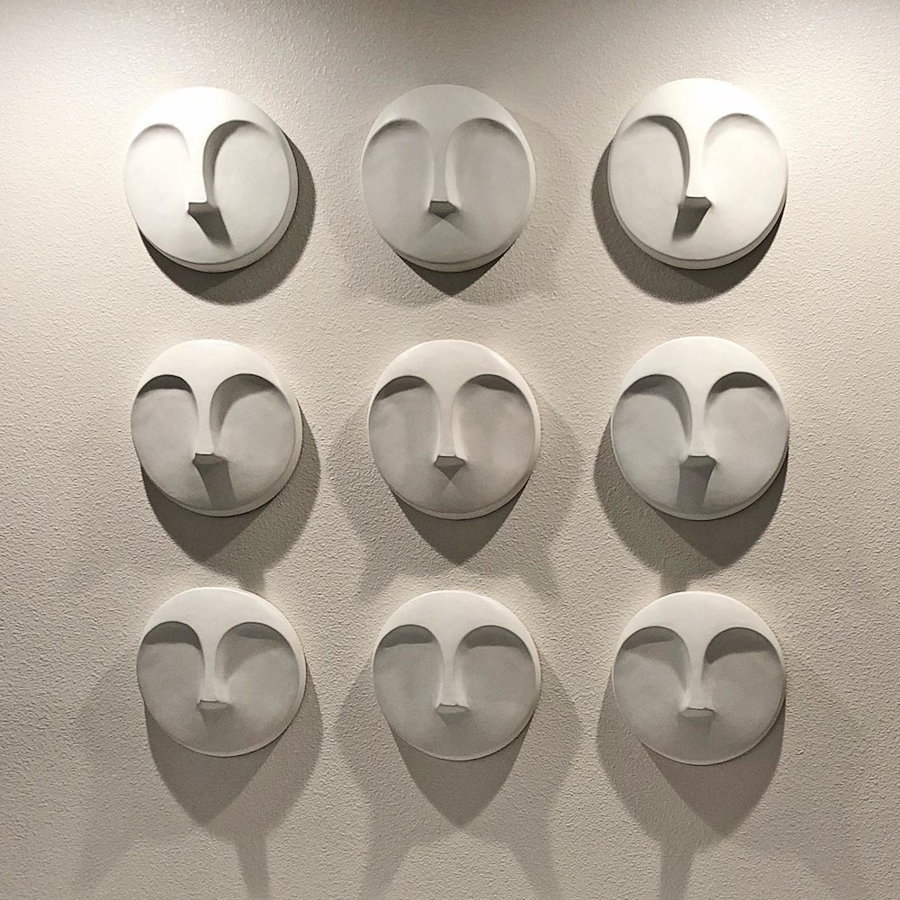 Matte White Round Face Wall Sculpture. Picture 2