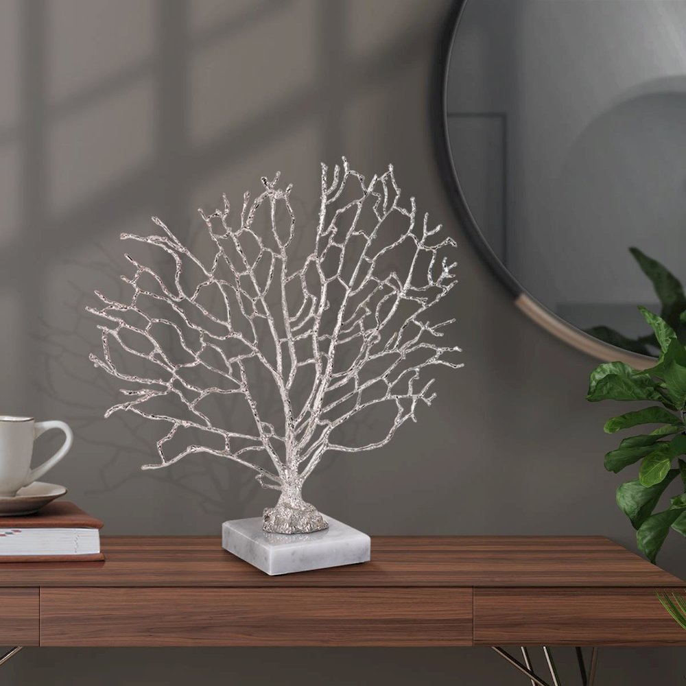 Study of Coral Sculpture On A White Marble Base. Picture 3
