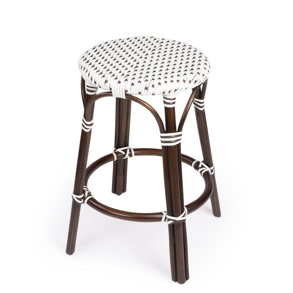 Tobias Rattan Round 24" Counter Stool, White and Brown Dot. Picture 1