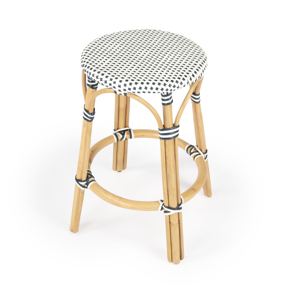 Tobias Rattan Round 24" Counter Stool, White and Navy Dot. Picture 1
