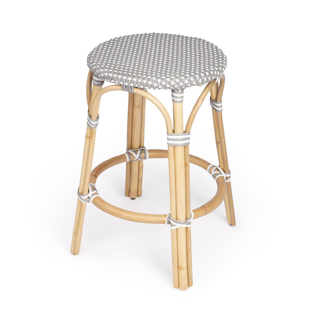 Tobias Rattan Round 24" Counter Stool, Gray and White Dot. Picture 1