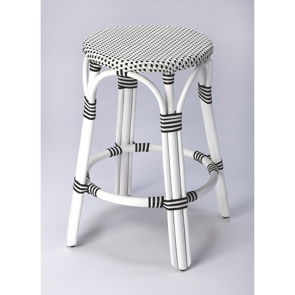 Tobias Rattan Round 24" Counter Stool, White and Black Dot. Picture 1