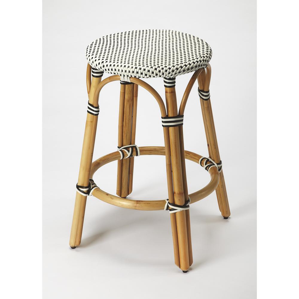 Tobias Rattan Round 24" Counter Stool, White and Black Dot. Picture 1
