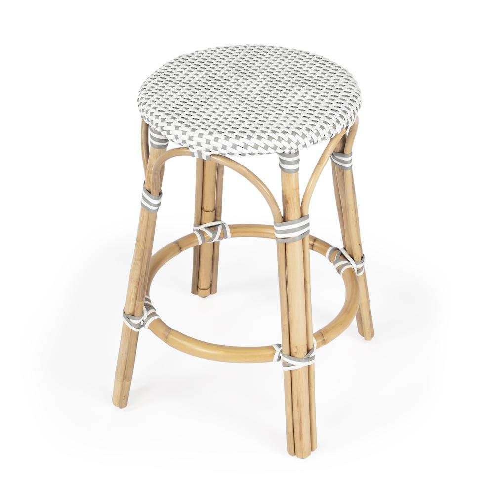 Tobias Rattan Round 24" Counter Stool, White and Gray Dot. Picture 1