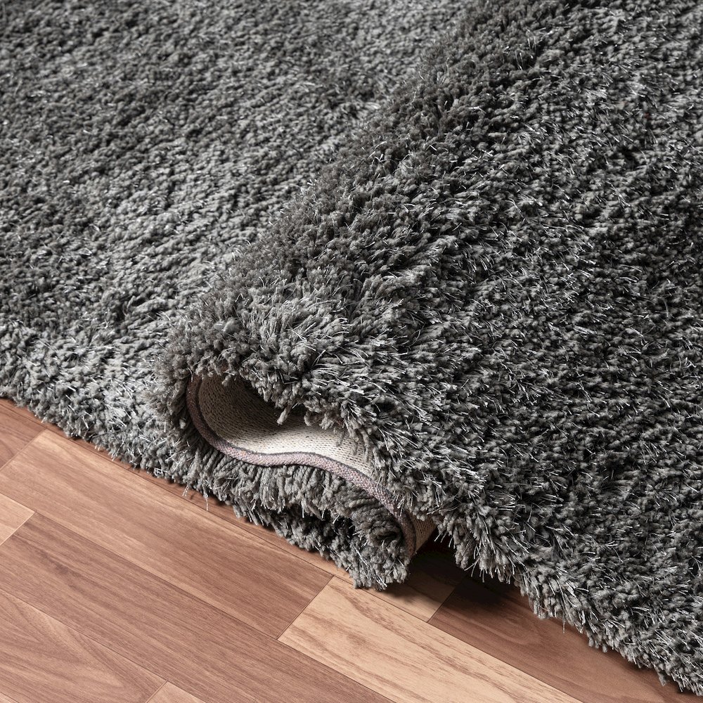 Black Shag Solid Hand-Loomed Polyester Indoor Area Rug. Picture 4