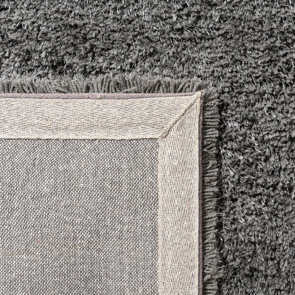 Black Shag Solid Hand-Loomed Polyester Indoor Area Rug. Picture 6