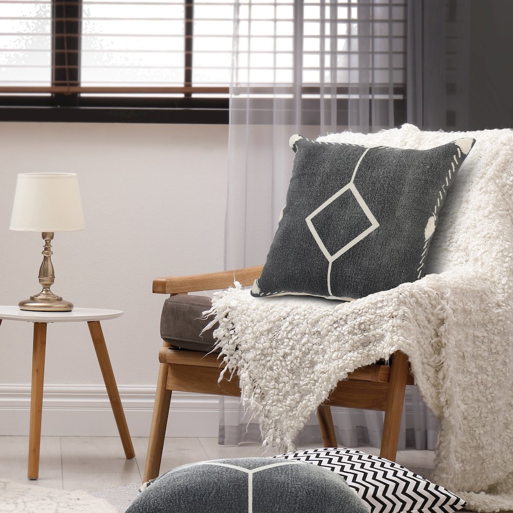 Evette Rios Avant-Garde Bordered and Tufted Geometric Throw Pillow. Picture 7