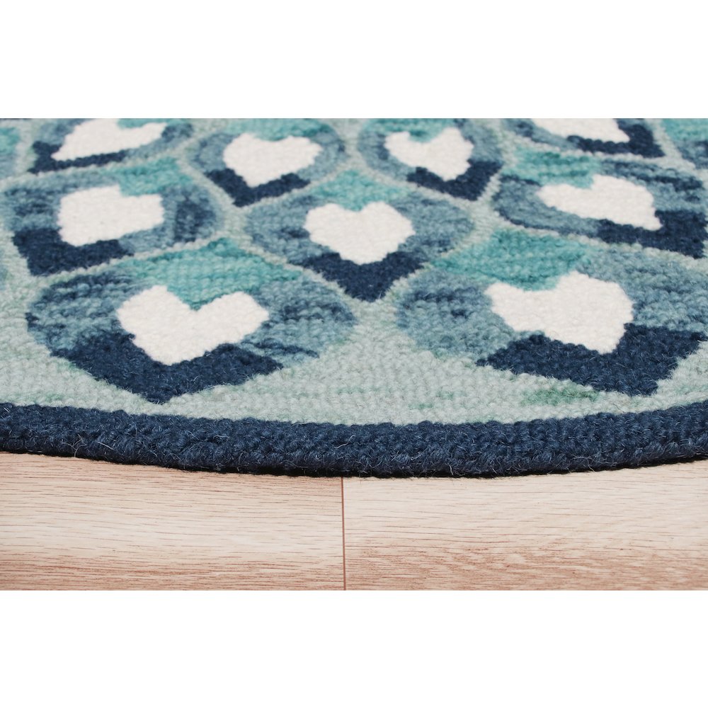 Hand Tufted Feathering Floral Round Rug. Picture 4