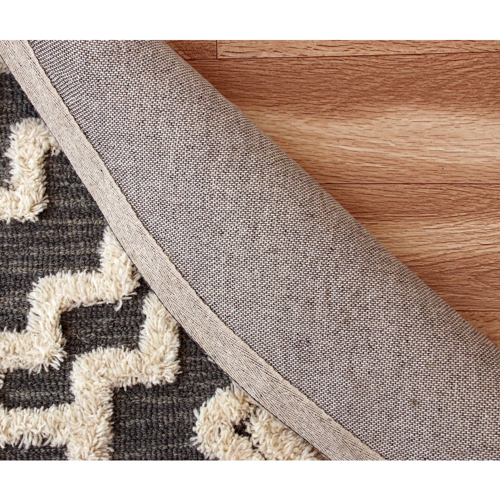 Evette Rios Sinuous Contemporary Tufted Geometric Wool Blend Area Rug, 4' Round. Picture 2