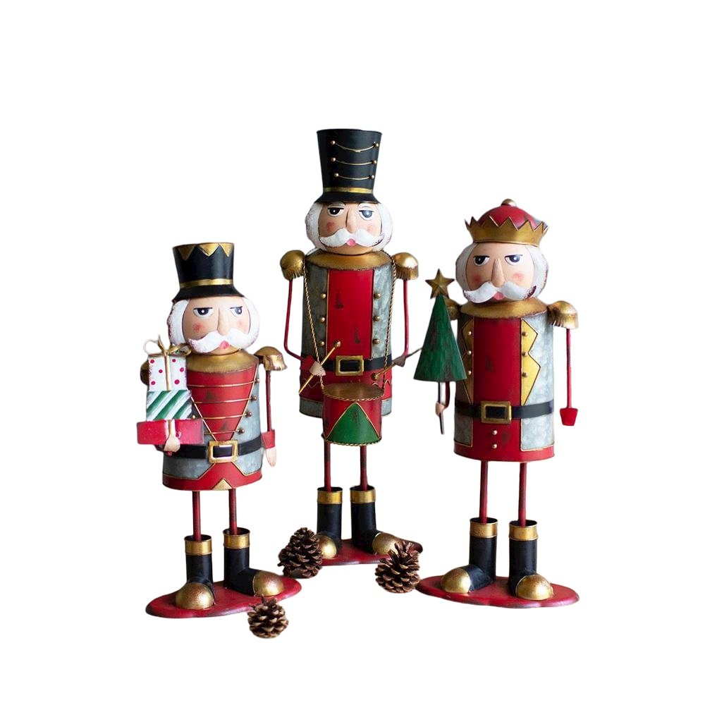 Set Of Three Painted Metal Nutcrackers - One Each Design. Picture 1