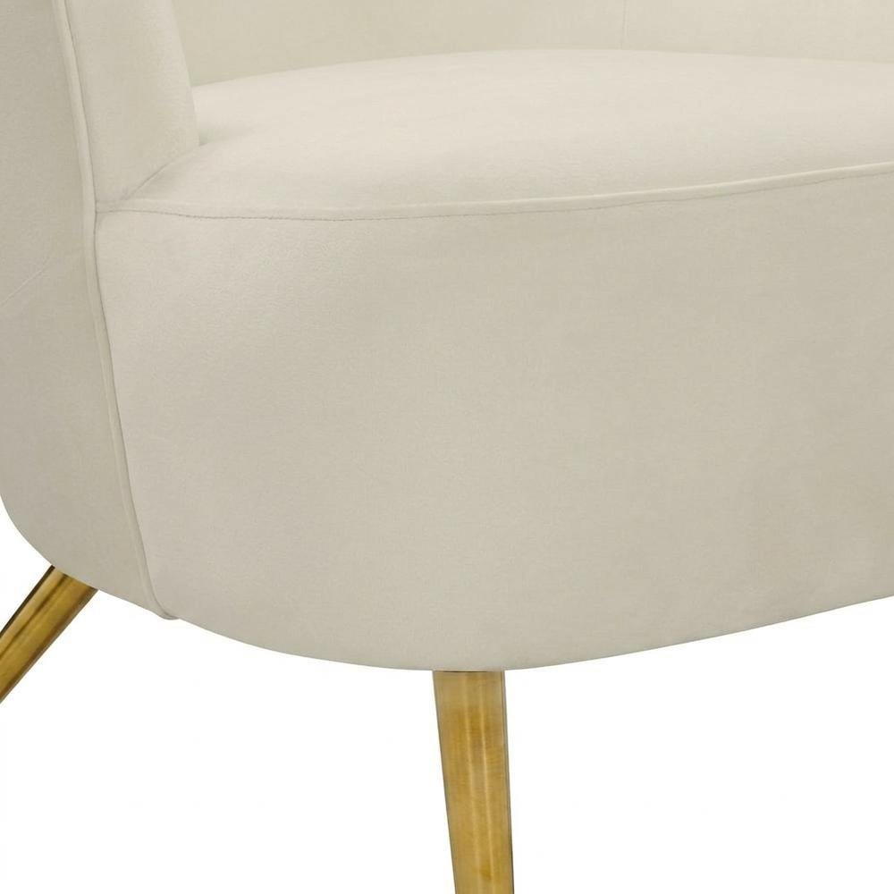 Cream Wingback Armchair with Padded Upholstery and Stylish Design. Picture 7