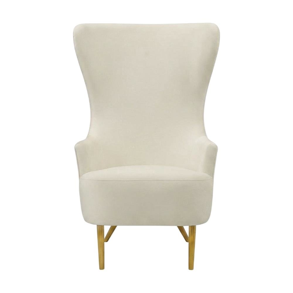 Cream Wingback Armchair with Padded Upholstery and Stylish Design. Picture 1